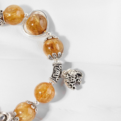 Vòng thạch anh tóc vàng AAA+ charm bạc Ngọc Quý Gemstones