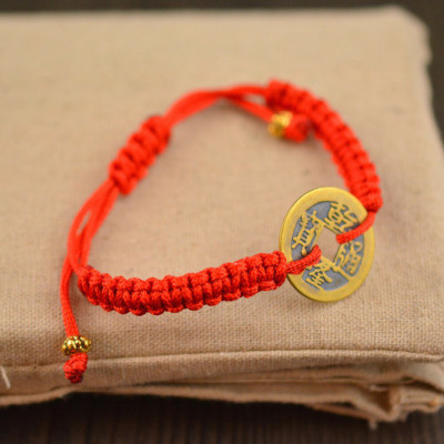 vòng tay chỉ đỏ may mắn thái lan VÒNG TAY DÂY ĐỎ XU NGŨ ĐẾ MAY MẮN VÀ TÀI LỘC