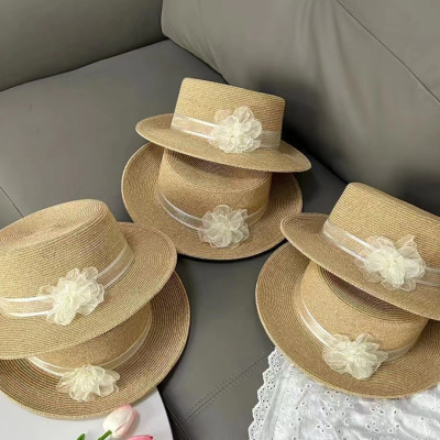 Nón đi biển mũ rộng vành phớt cao bồi cho nữ đai trắng gắn hoa xinh chất liệu cói chống nắng thoáng mát thời trang Hàn Quốc  dona240707