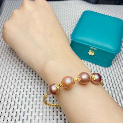 Vòng tay ngọc trai nuôi tứ quý kết hợp cùng bạc ta xi vàng