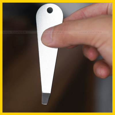 Dụng cụ mở giỏ lọc cho tay cầm pha espresso