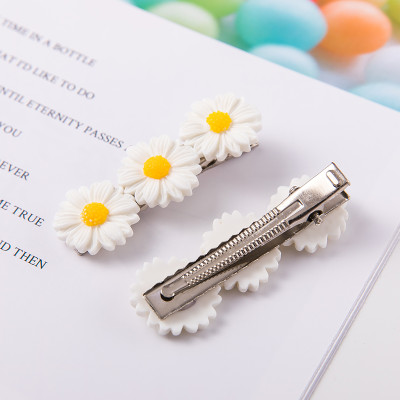 Set 5 dây buộc tóc và cặp tóc Hoa cúc