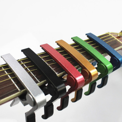  Capo đàn Guitar Woim PK92 loại kẹp ngang tiện dụng ( Màu ngẫu nhiên )