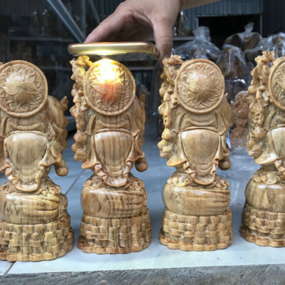 Tượng phật di lặc gánh tiền vàng bằng gỗ huyết long kt cao 20cm