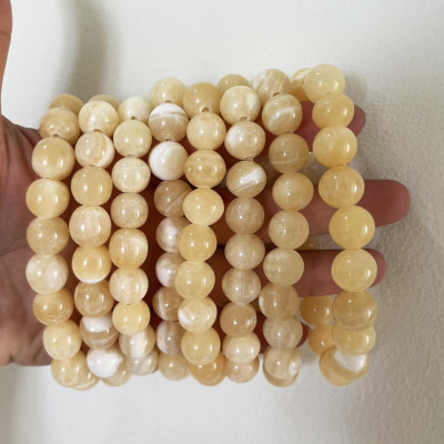 Vòng tay chuỗi hạt ngọc thật màu vàng cam cho người mệnh Thổ và hỏa đường kính hột 10 li (1cm)