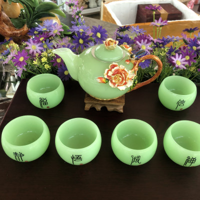 Bộ ấm trà chạm hoa mẫu đơn và chim với ly chạm chữ đá ngọc cẩm thạch xanh